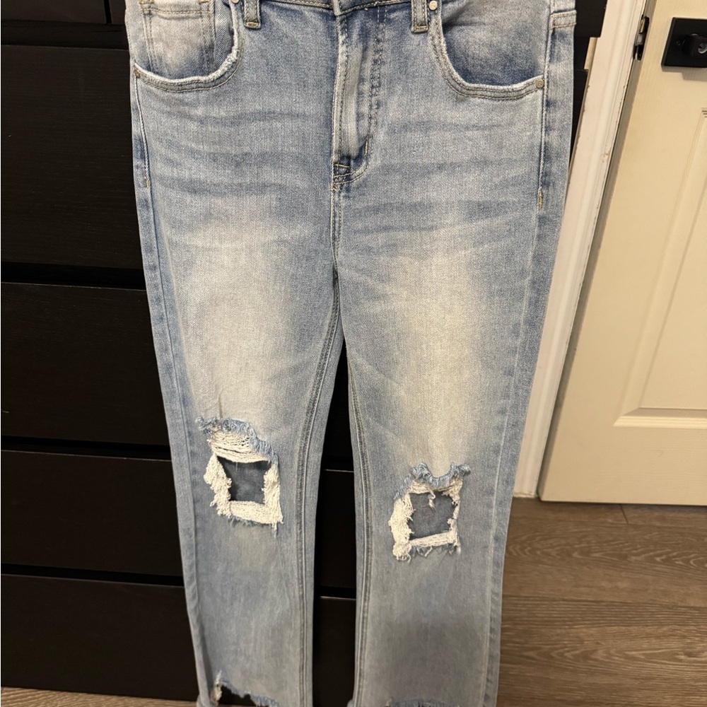 Distressed Light Blue Flare Jeans